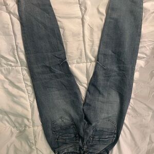 Indigo Skinny Jeans with Distressed Knee Details